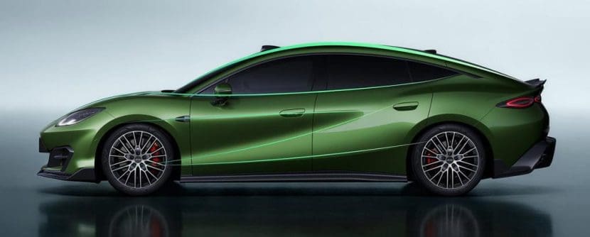 Img4436 | ยางรถยนต์ ราคาอัปเดต 2026 ครบทุกยี่ห้อ รวมยาง Ev | Autotirechecking Green sports car in profile view with black roof and large alloy wheels, red brake calipers visible