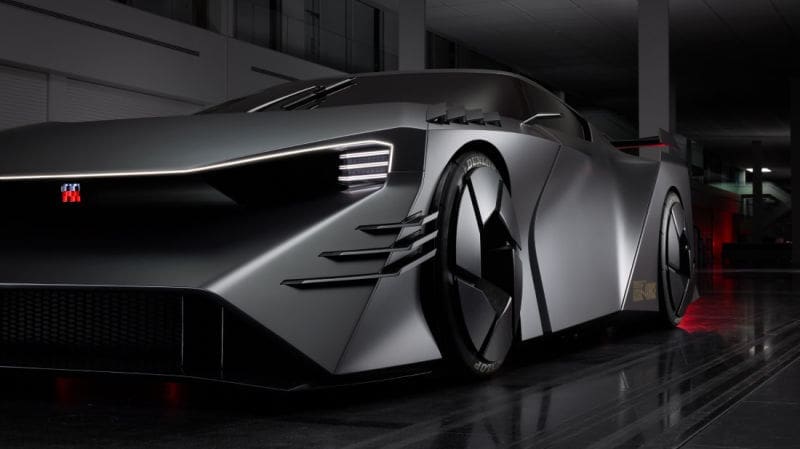 Futuristic silver concept car in a dark showroom with sharp angles and glowing headlights, viewed from a low front-right angle, sleek and aggressive.