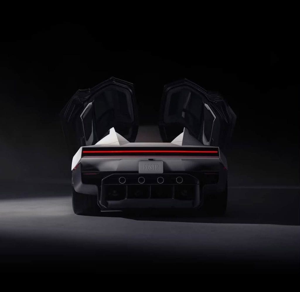 Img5080 | ยางรถยนต์ ราคาอัปเดต 2026 ครบทุกยี่ห้อ รวมยาง Ev | Autotirechecking Rear view of a futuristic sports car with scissor doors open, glowing red taillight strip in a dark studio.