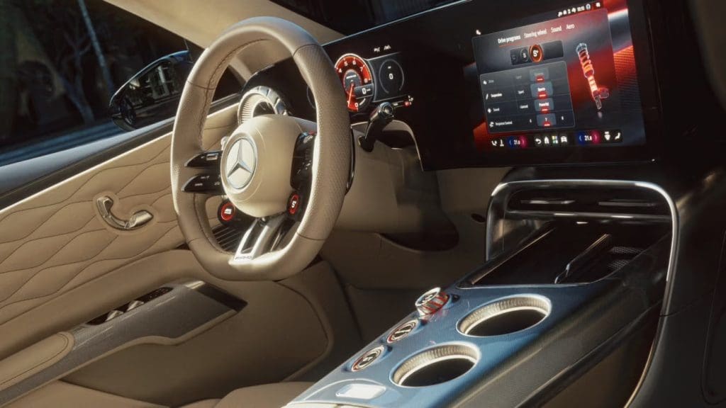 Img5148 | ยางรถยนต์ ราคาอัปเดต 2026 ครบทุกยี่ห้อ รวมยาง Ev | Autotirechecking Luxurious beige Mercedes interior with steering wheel, digital dashboard, and center console with cupholders.