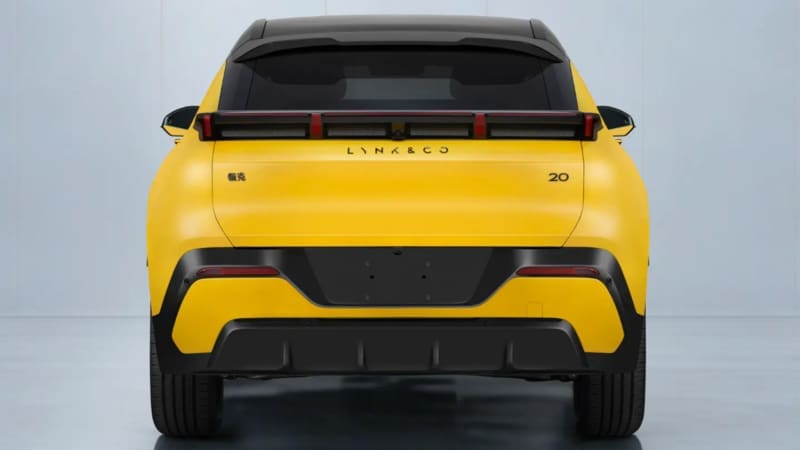 Rear view of a yellow Lynk & Co SUV with a black bumper, tailgate badge reading LYNK & CO, and a'20' badge on the right.