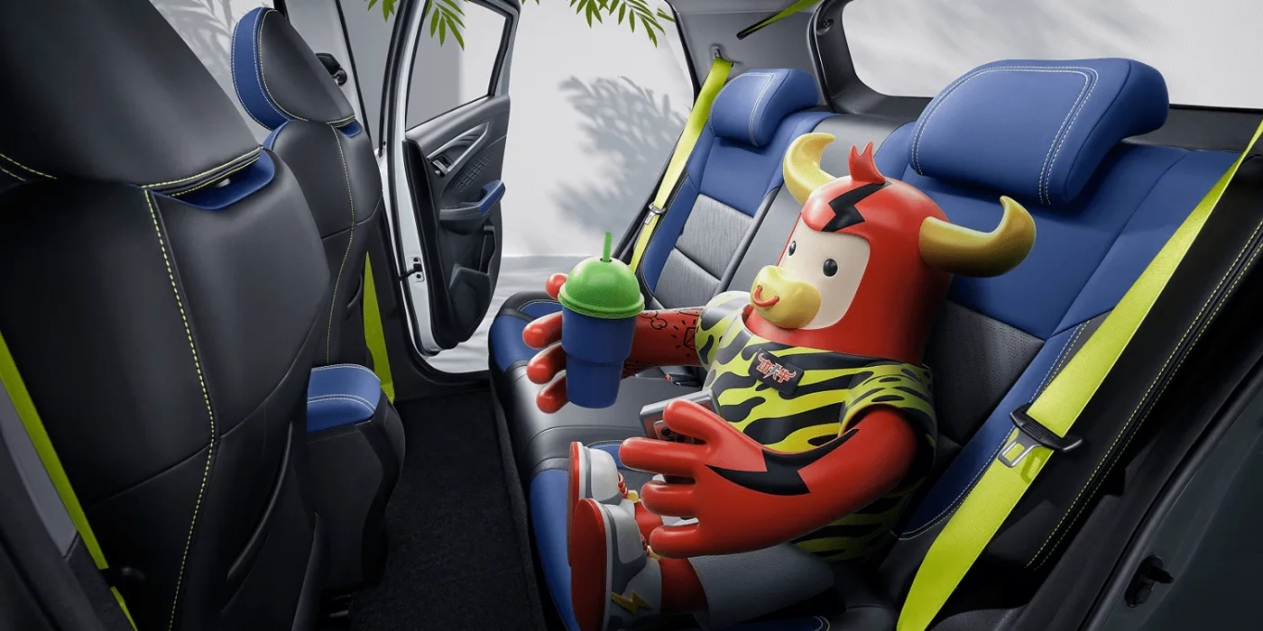 Geelygeometryex3rearseat2021 | ยางรถยนต์ ราคาอัปเดต 2026 ครบทุกยี่ห้อ รวมยาง Ev | Autotirechecking พื้นที่เบาะหลัง Geometry EX3 พร้อมมาสคอตในภาพประชาสัมพันธ์ปี 2021