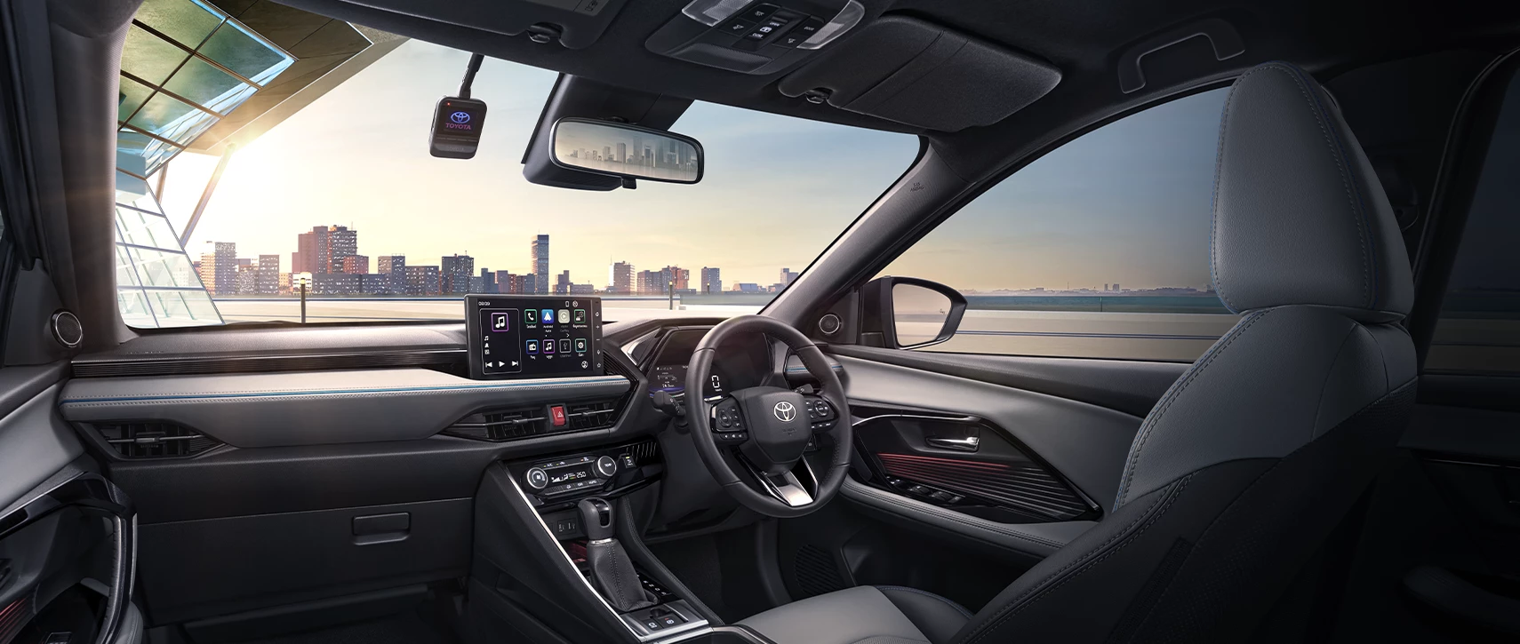 Toyotayariscross2026interiorthailand | ยางรถยนต์ ราคาอัปเดต 2026 ครบทุกยี่ห้อ รวมยาง Ev | Autotirechecking ห้องโดยสาร Toyota Yaris Cross รุ่นไทย พวงมาลัยขวาและหน้าจอกลาง